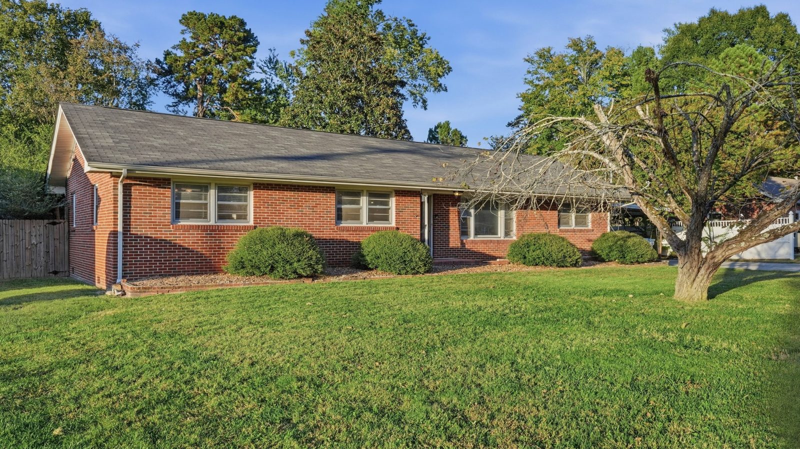 Brick exterior and front lawn at 1003 Oak Drive