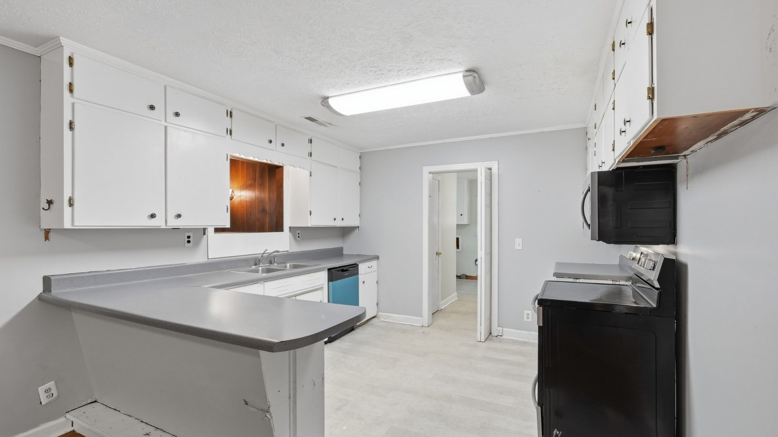 Kitchen with white cabinets at 1003 Oak Drive