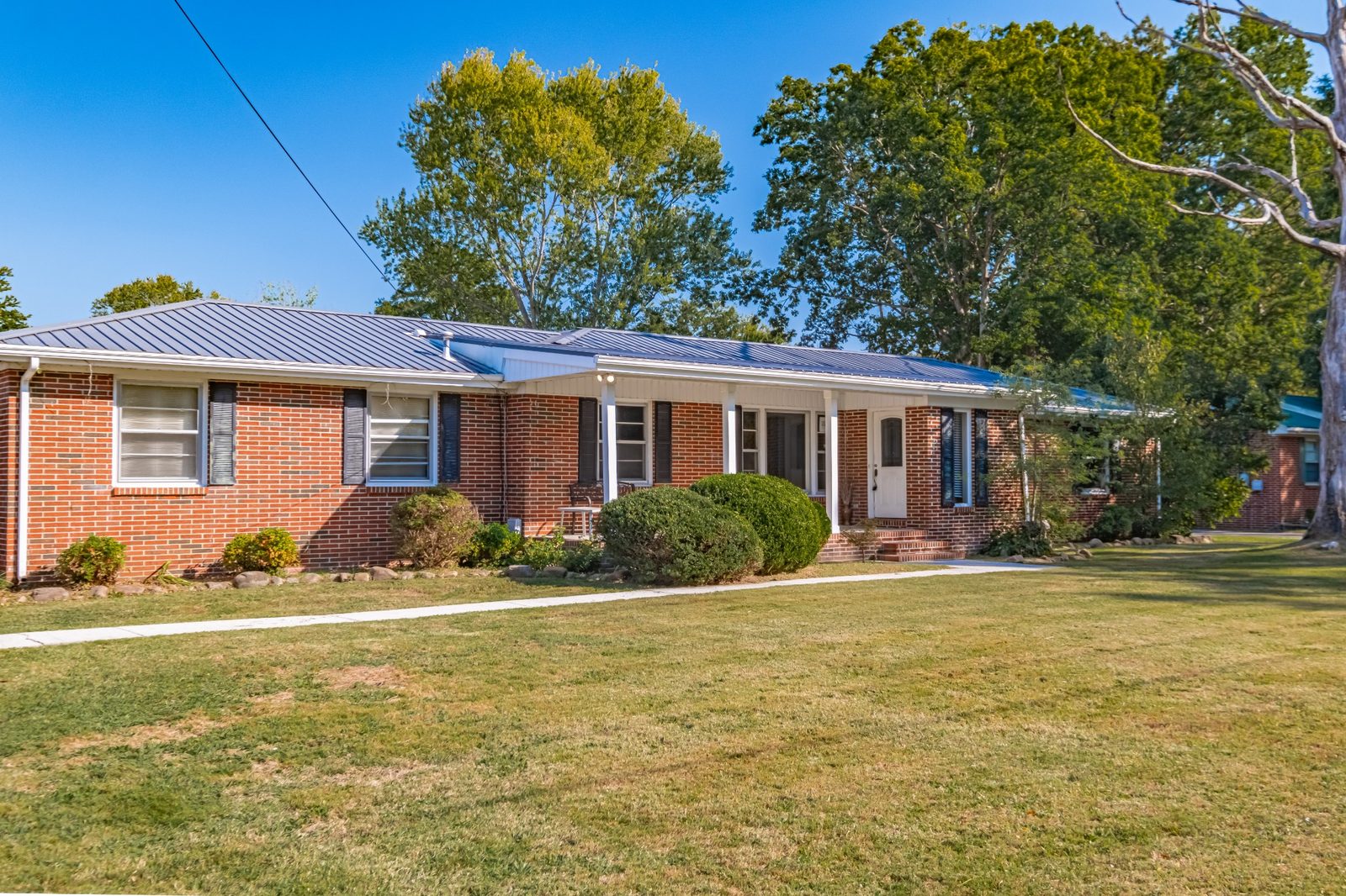 Front of the brick ranch home at 1201 Woodcrest Drive