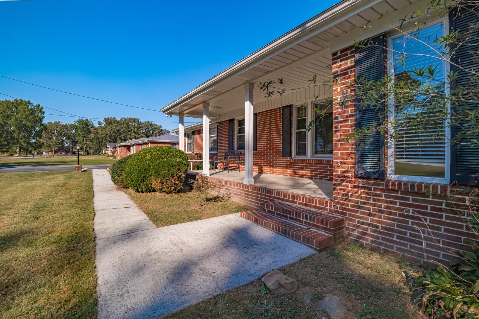 Front walk and covered porch at 1201 Woodcrest Drive