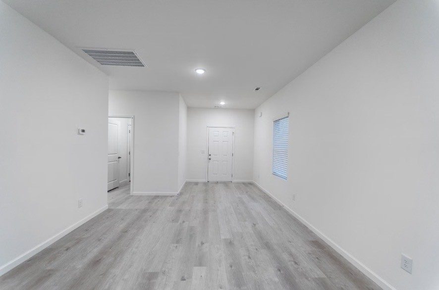 Living area, shown for the same floor plan at 18 Stonehenge Circle NW