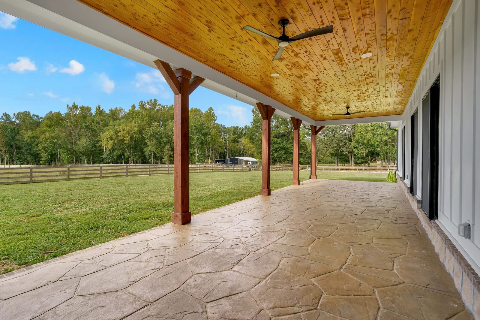 Covered rear patio with wood ceiling at 2216 Sp Anderson Road