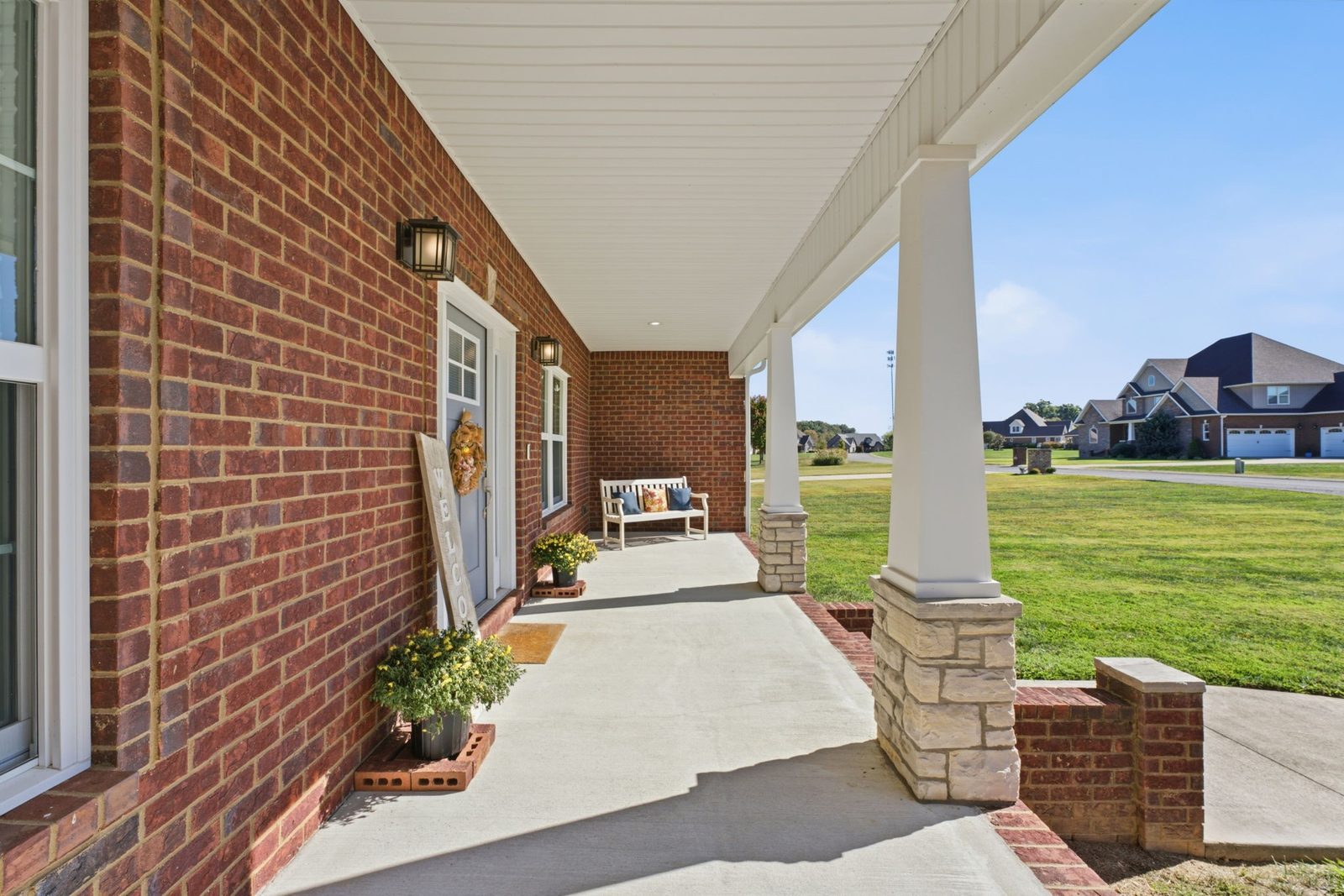 Side view of the covered porch at 241 Roberts Creek Circle