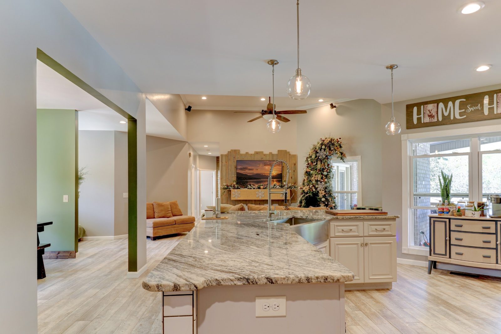 Kitchen with large island open to the living room at 247 Days End Lane
