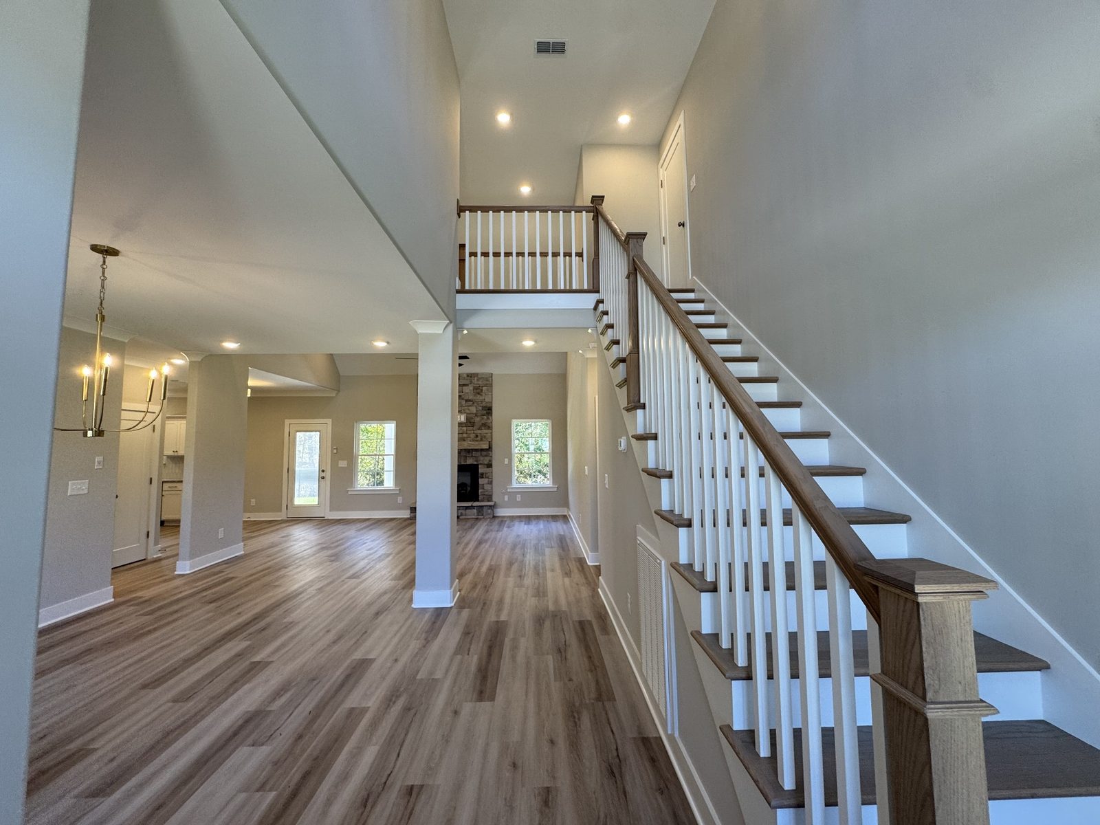 Entry with staircase and open layout at 61 Spring House Drive