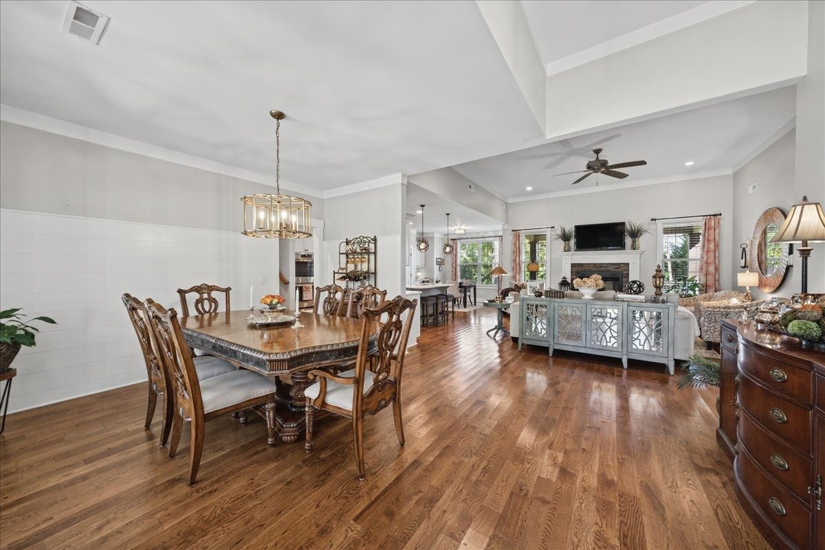 Dining room and living room with wood floors at 612 Lexington Circle