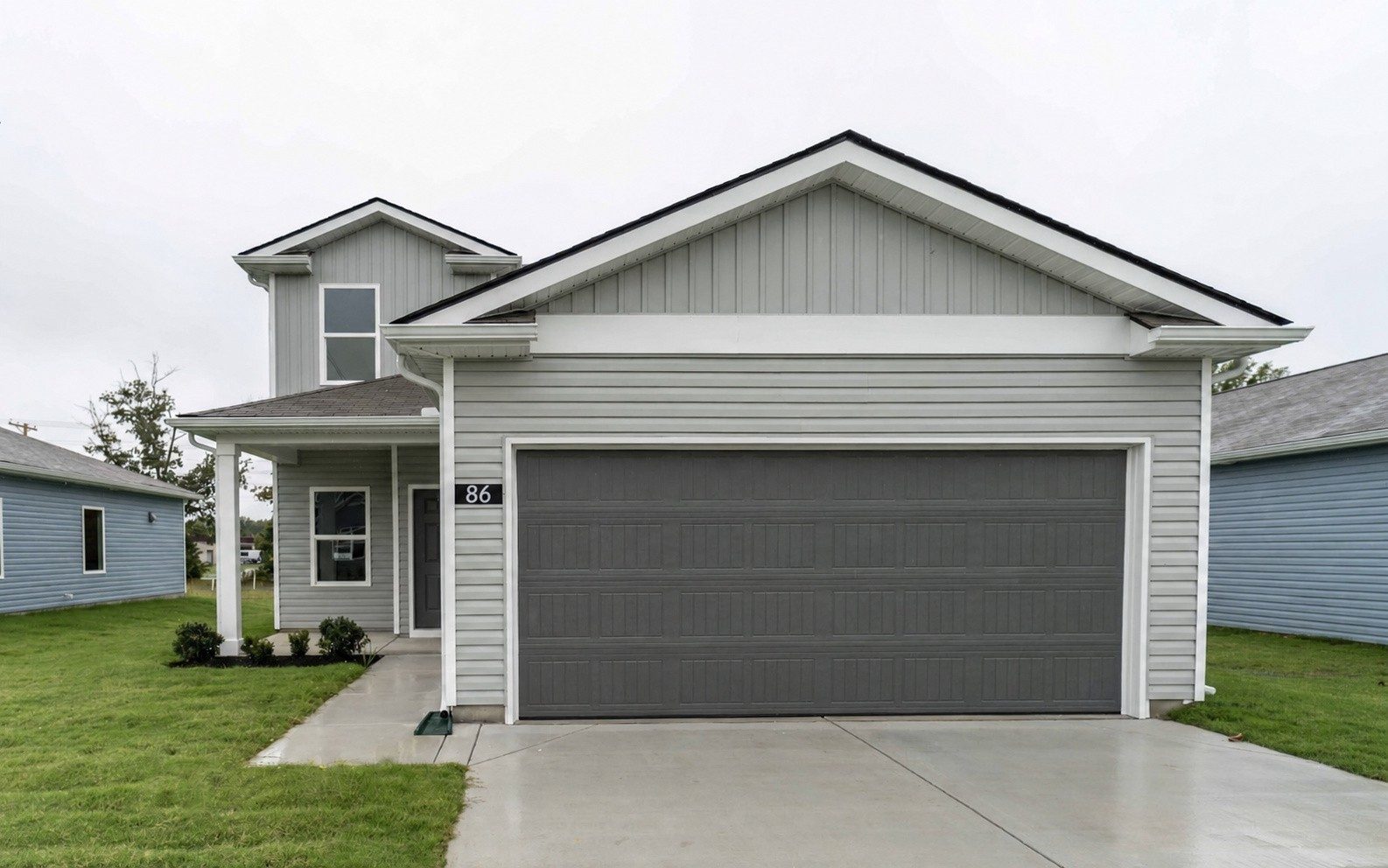 Exterior photo of the Adam plan with a two car garage at 86 Stonehenge Lane