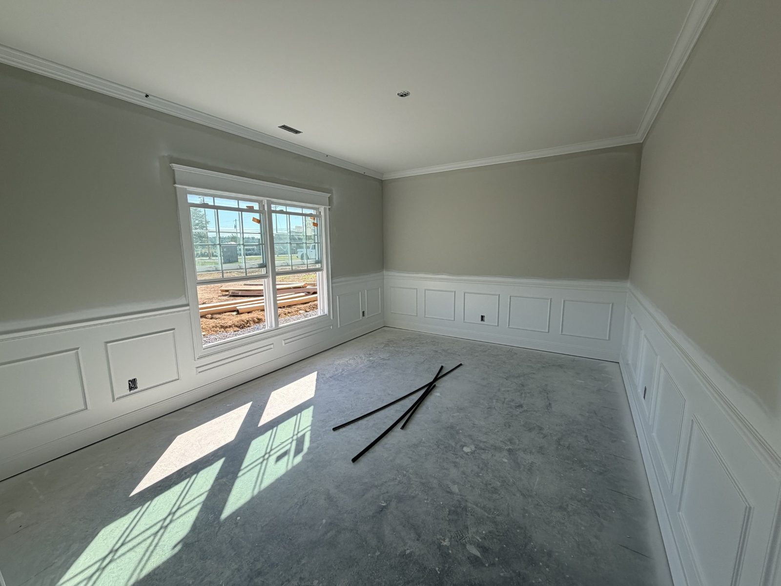 Room with wainscoting during construction at 8689 Fredonia Road