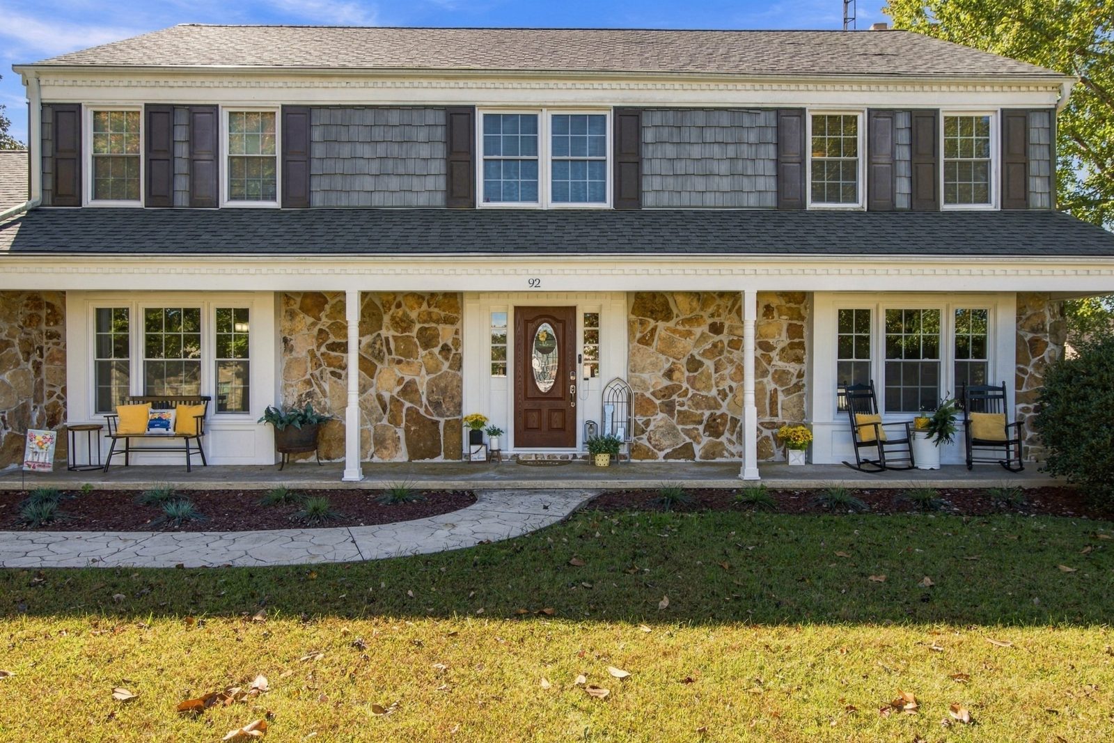 Front porch with stone accents at 92 Bluegrass Road