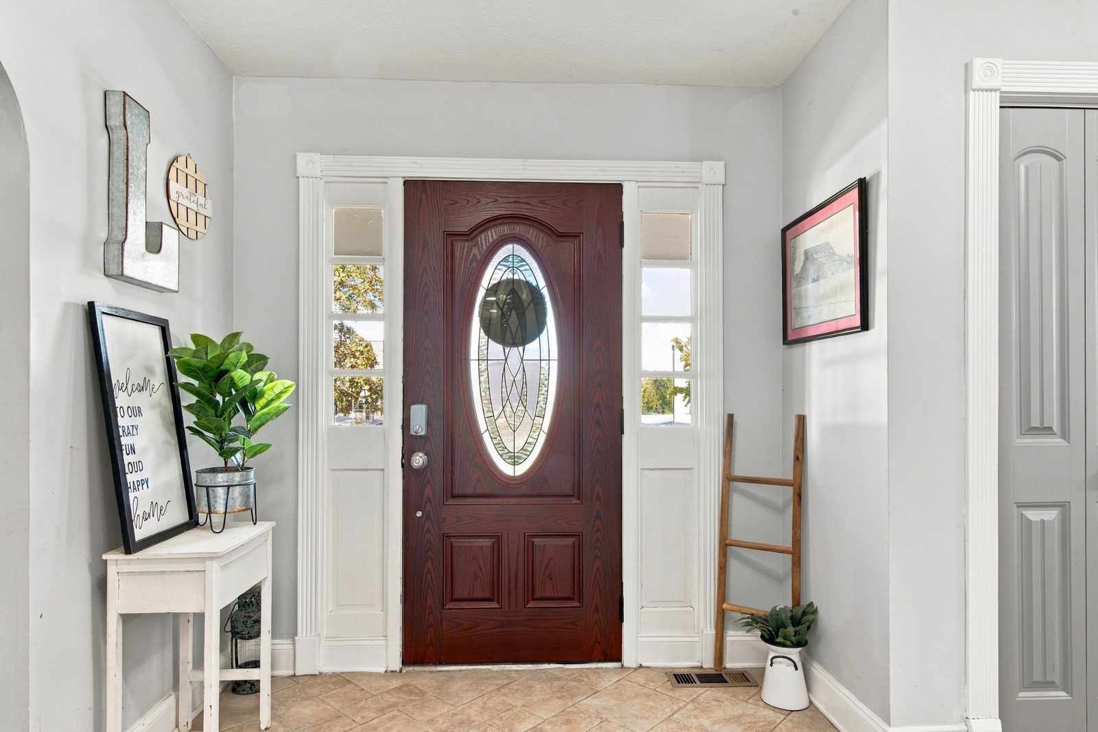 Front entry with oval glass door at 92 Bluegrass Road